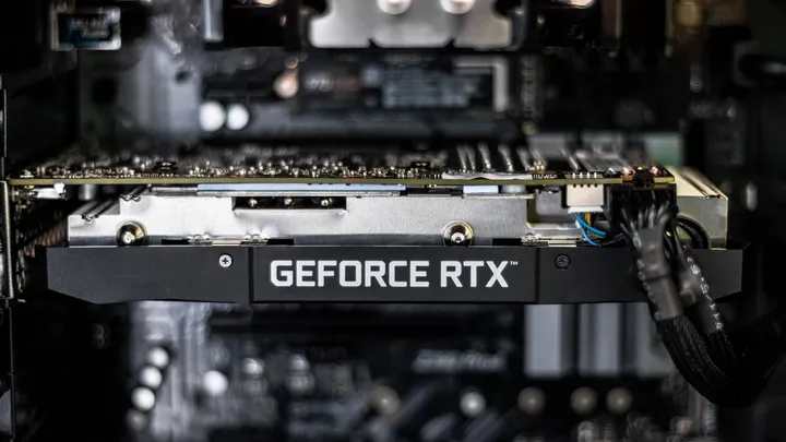 A dark close-up of an Nvidia data center GPU module, representing rising AI server costs