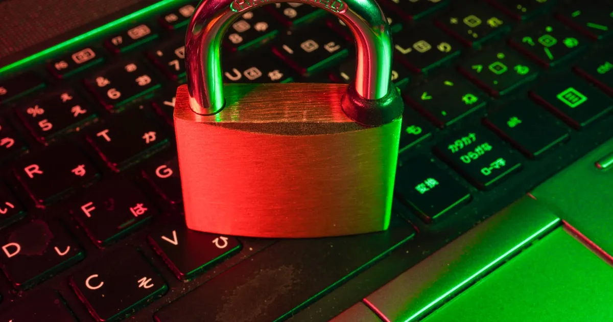 A red padlock resting on a laptop keyboard, representing a bypassed security boundary