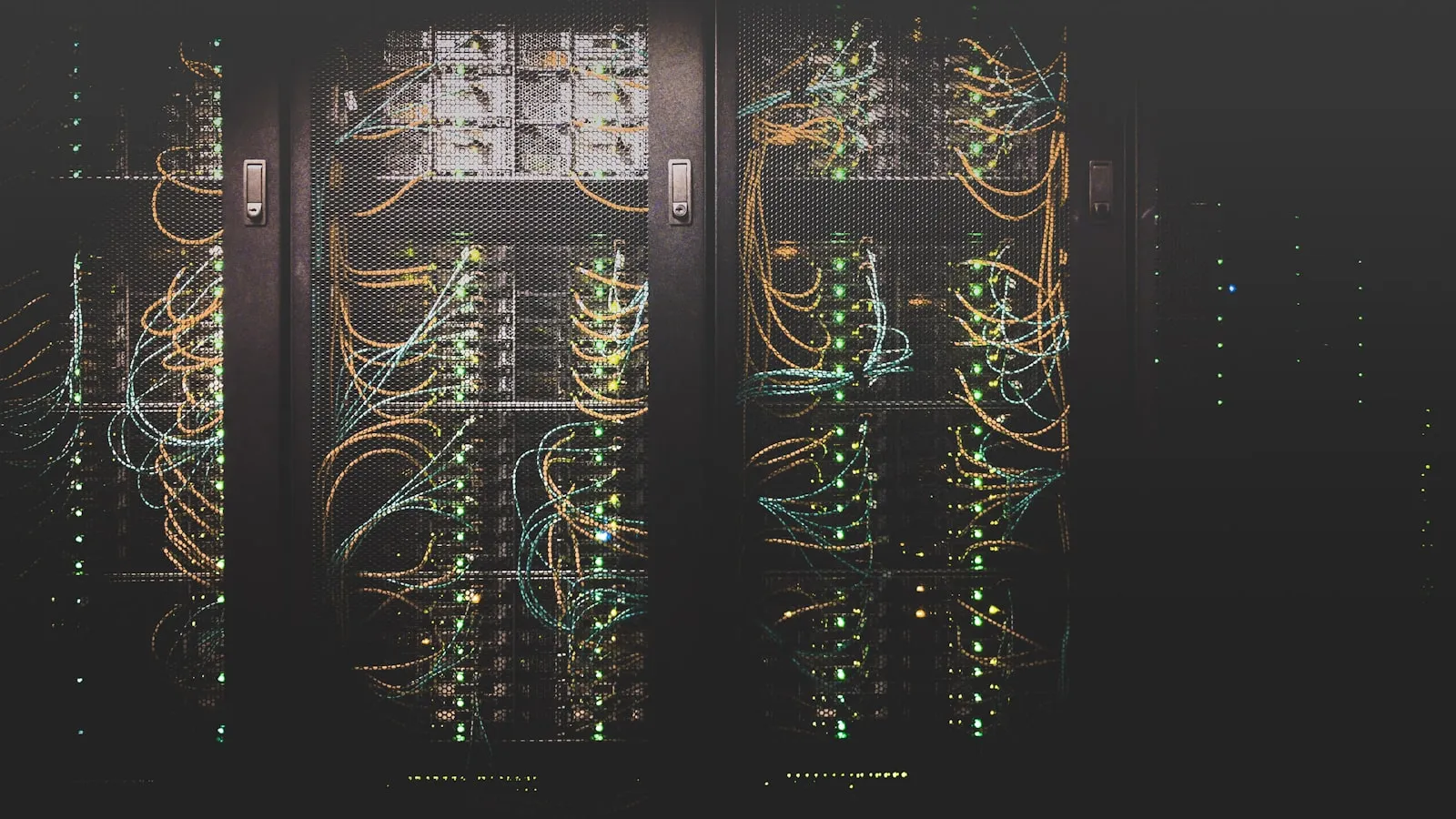 A dense arrangement of network cabling and switches in a server room
