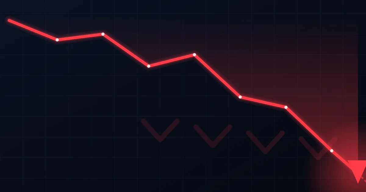 A stock ticker display showing a downward arrow