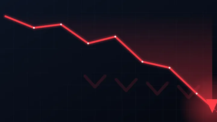 A digital stock ticker board showing prices falling in red